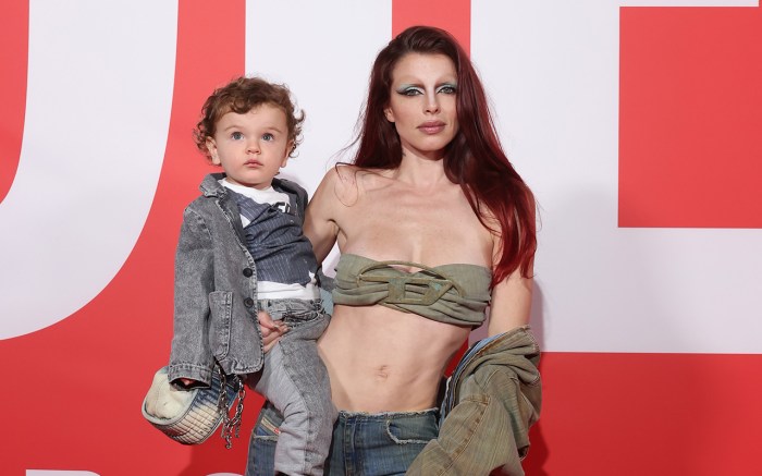 MILAN, ITALY - FEBRUARY 22: Julia Fox and Valentino Fox attend the Diesel Fashion Show during Milan Fashion Week Womenswear Fall/Winter 2023/24 on February 22, 2023 in Milan, Italy. (Photo by Victor Boyko/Getty Images for Diesel)