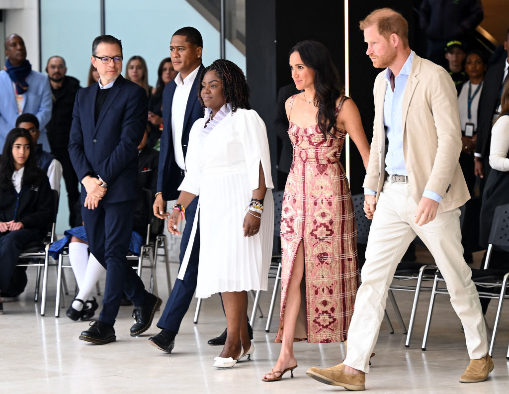 Colombia's vice-President Francia Marquez (C) and her partner Yerney Pinillo (2nd L) are pictured next to Britain's Prince Harry (R), Duke of Sussex, his wife Meghan Markle (2nd R), and Colombian Culture Minister, Juan David Correa (L), while attending a show during a visit to the National Centre for the Arts in Bogota on August 15, 2024. Prince Harry and his wife, American actress Meghan Markle, arrived in Colombia at the invitation of Marquez, with whom they will attend various meetings with women and young people to reject discrimination and cyberbullying. (Photo by RAUL ARBOLEDA / AFP) (Photo by RAUL ARBOLEDA/AFP via Getty Images)