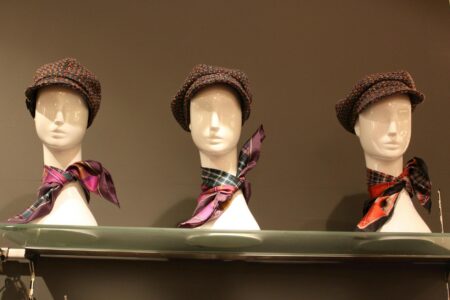 Elegant hair accessories arranged on a luxury display, showcasing various textures and materials