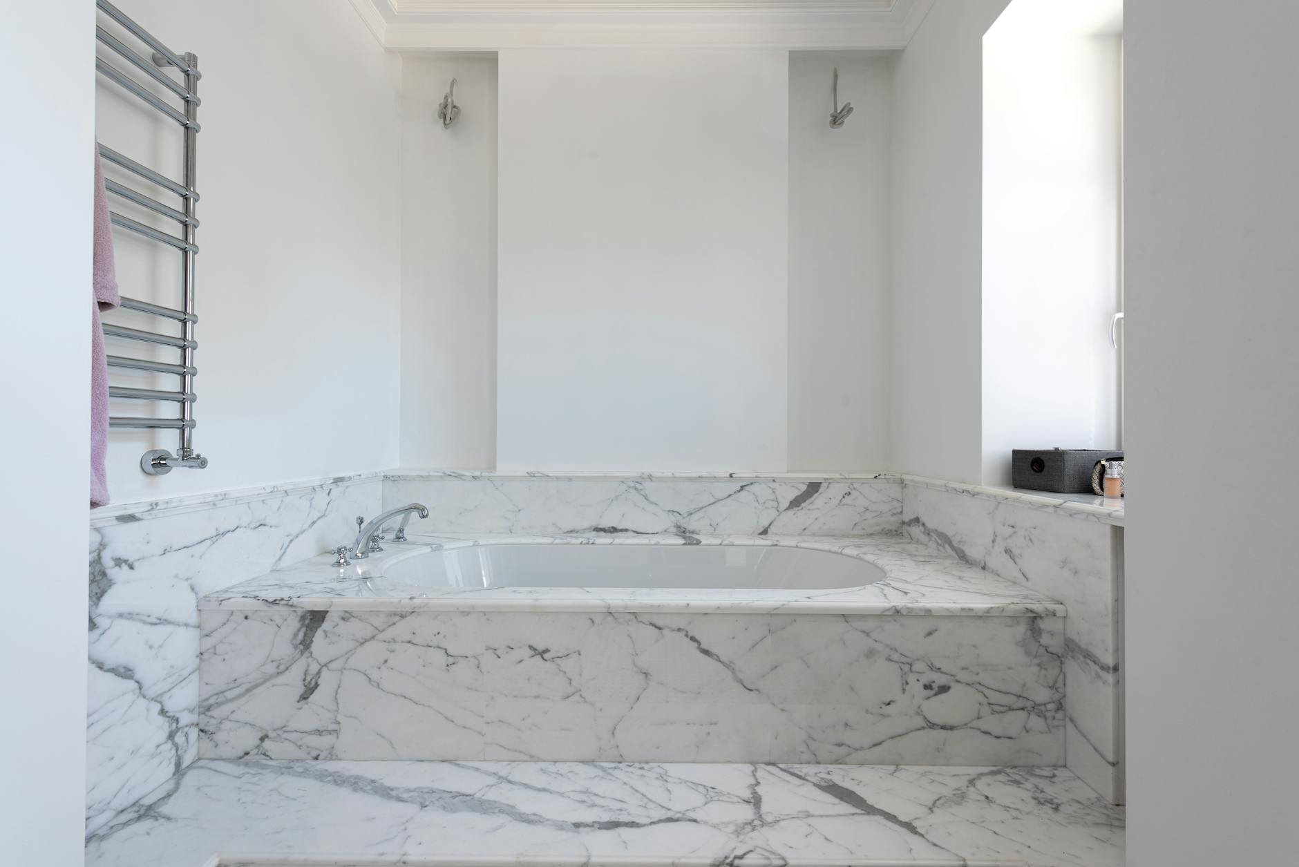 Luxurious spa interior with marble surfaces and ambient lighting creating a serene wellness environment