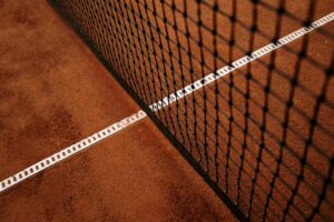 How Pickleball Fashion Became Tennis Country Club’s Status Symbol Well-maintained tennis court at an upscale country club facility