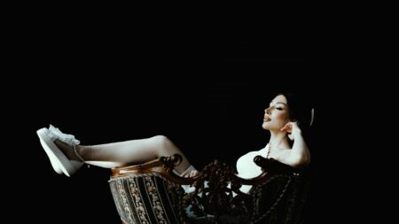 Premium white leather sneakers displayed on modern surface