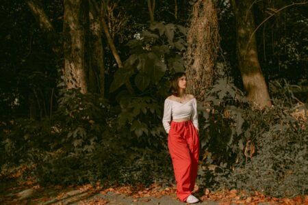 Stylish cargo pants displayed on fashion runway with luxury styling and accessories