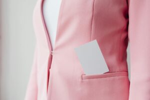 Professional woman wearing a structured blazer in modern office setting