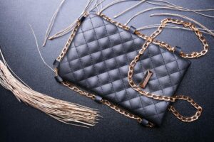 Display of luxury designer handbags showcasing premium leather goods and craftsmanship