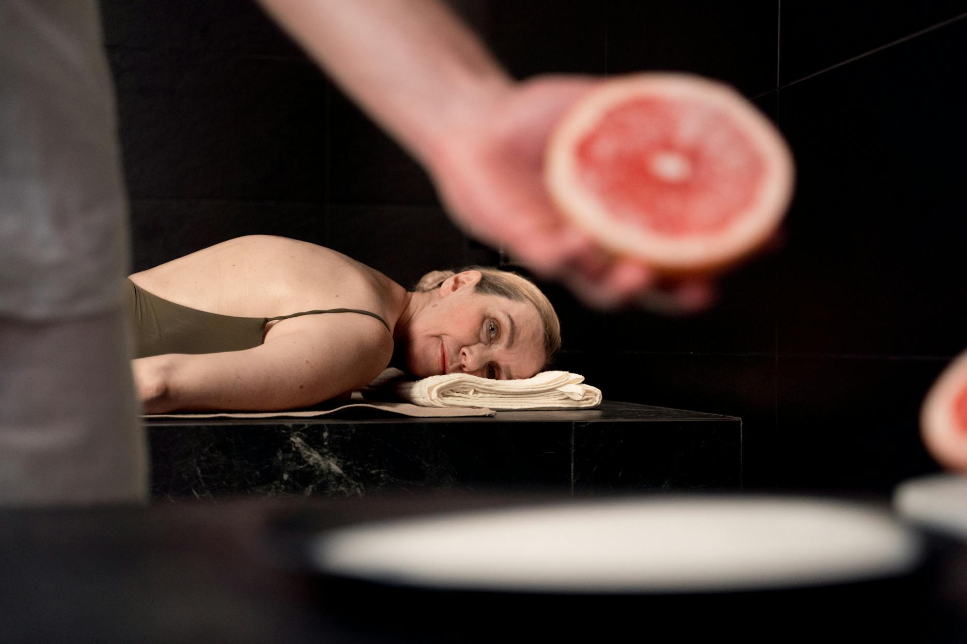 Serene spa treatment room with professional wellness equipment and calming atmosphere