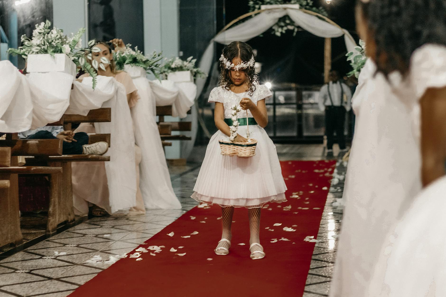 Elegant red carpet setting with photographers and formal event atmosphere