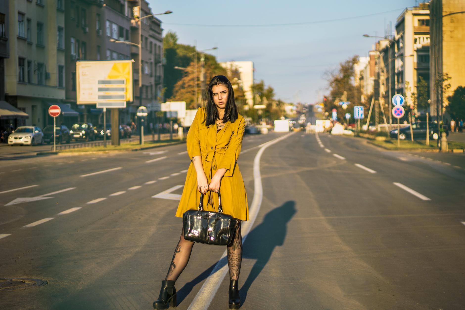 Stylish person wearing architectural blazer with contemporary street style accessories