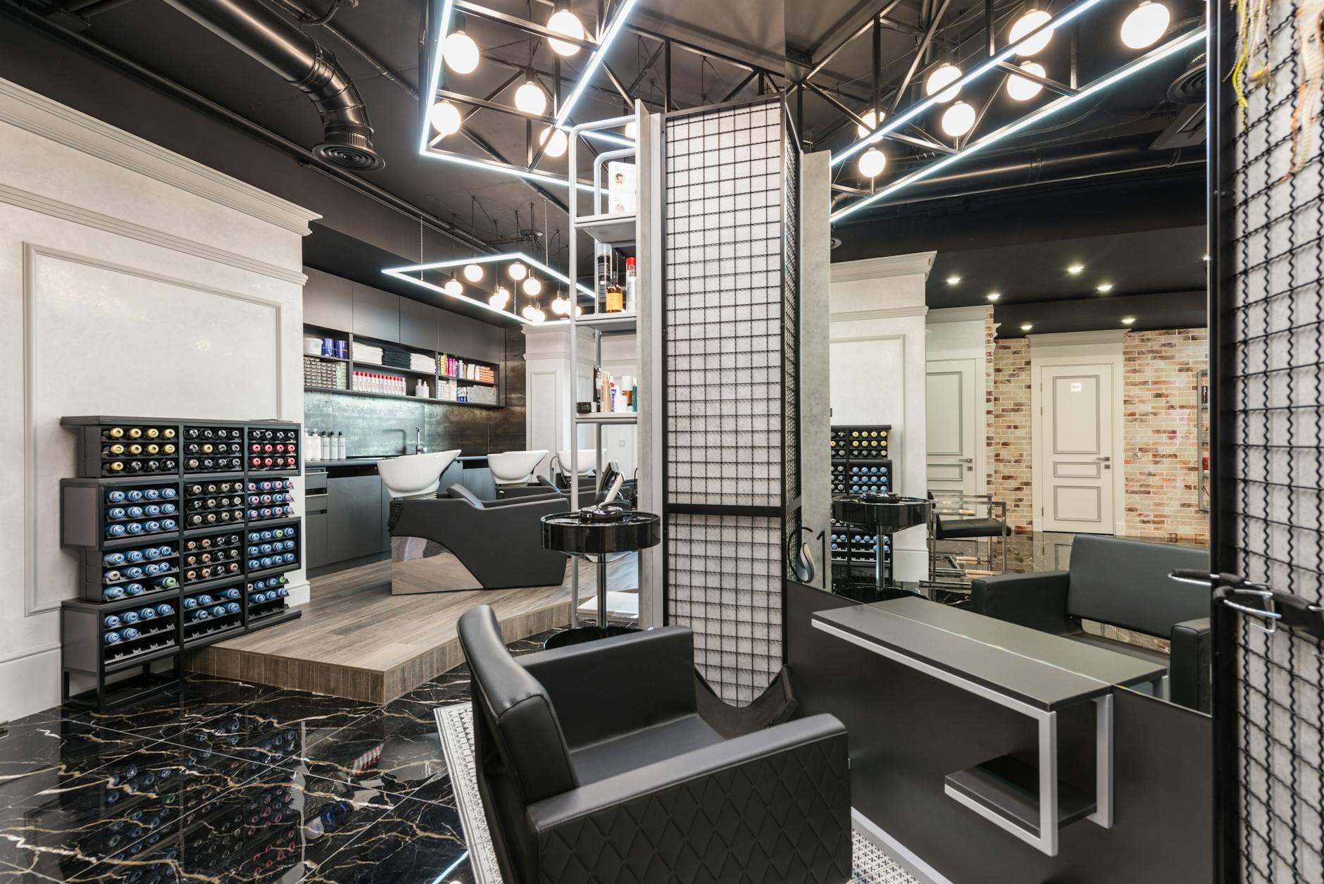 Modern barbershop interior with professional chairs and clean, organized workspace