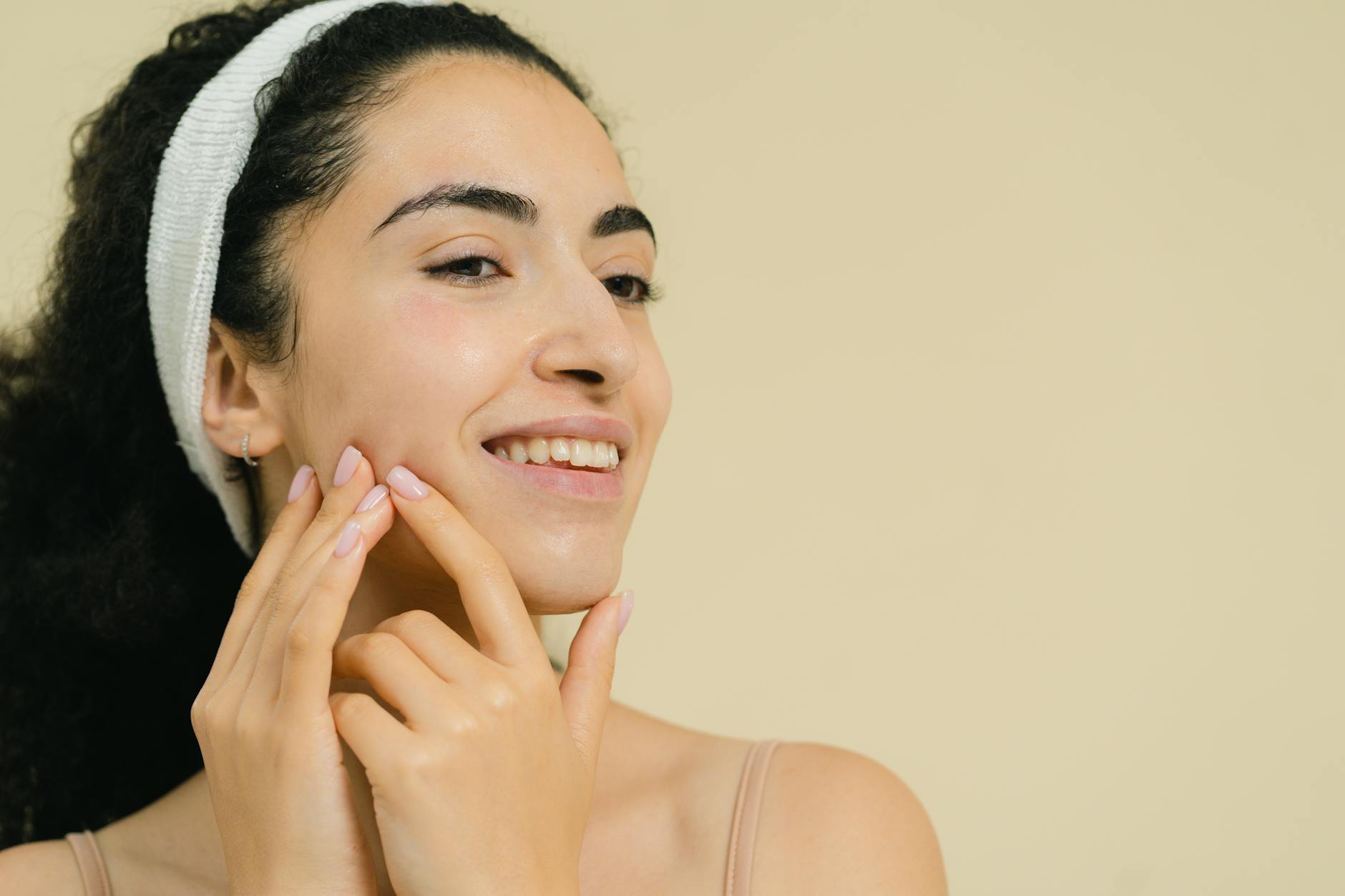 Woman with healthy clear skin after successful acne treatment