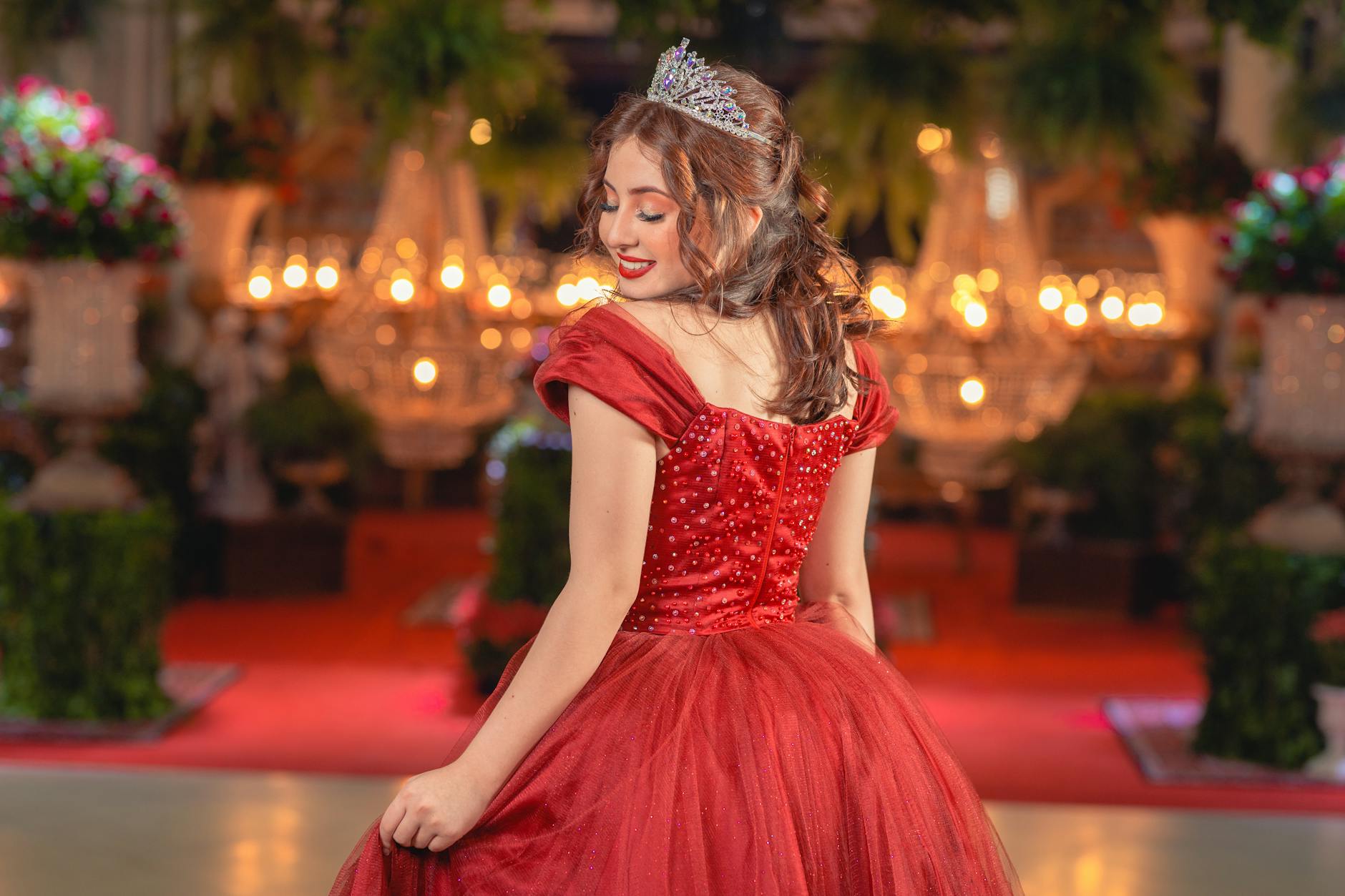 Elegant red carpet setup with velvet ropes and camera flashes