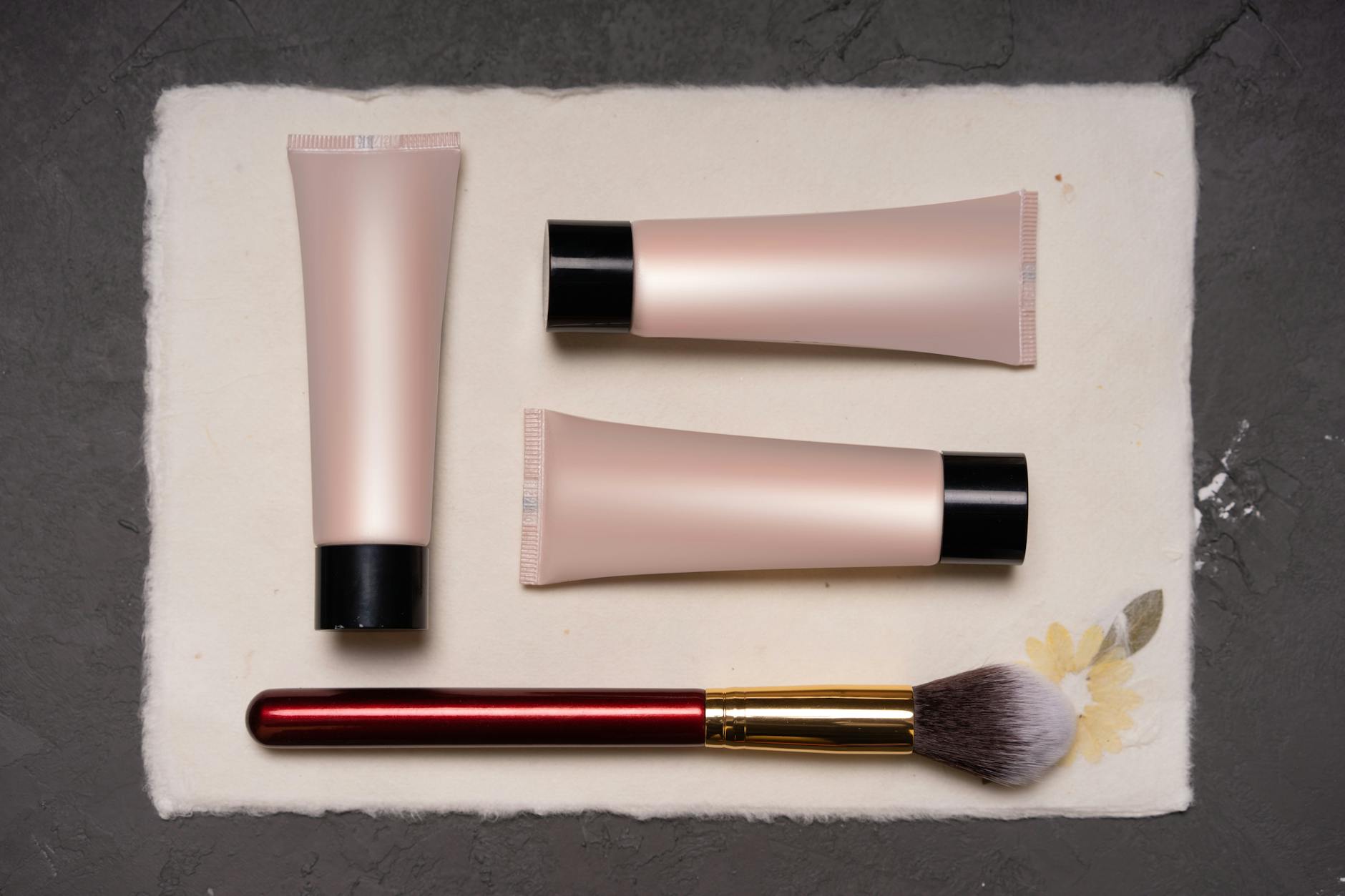 Professional beauty products arranged in clean studio lighting for photography