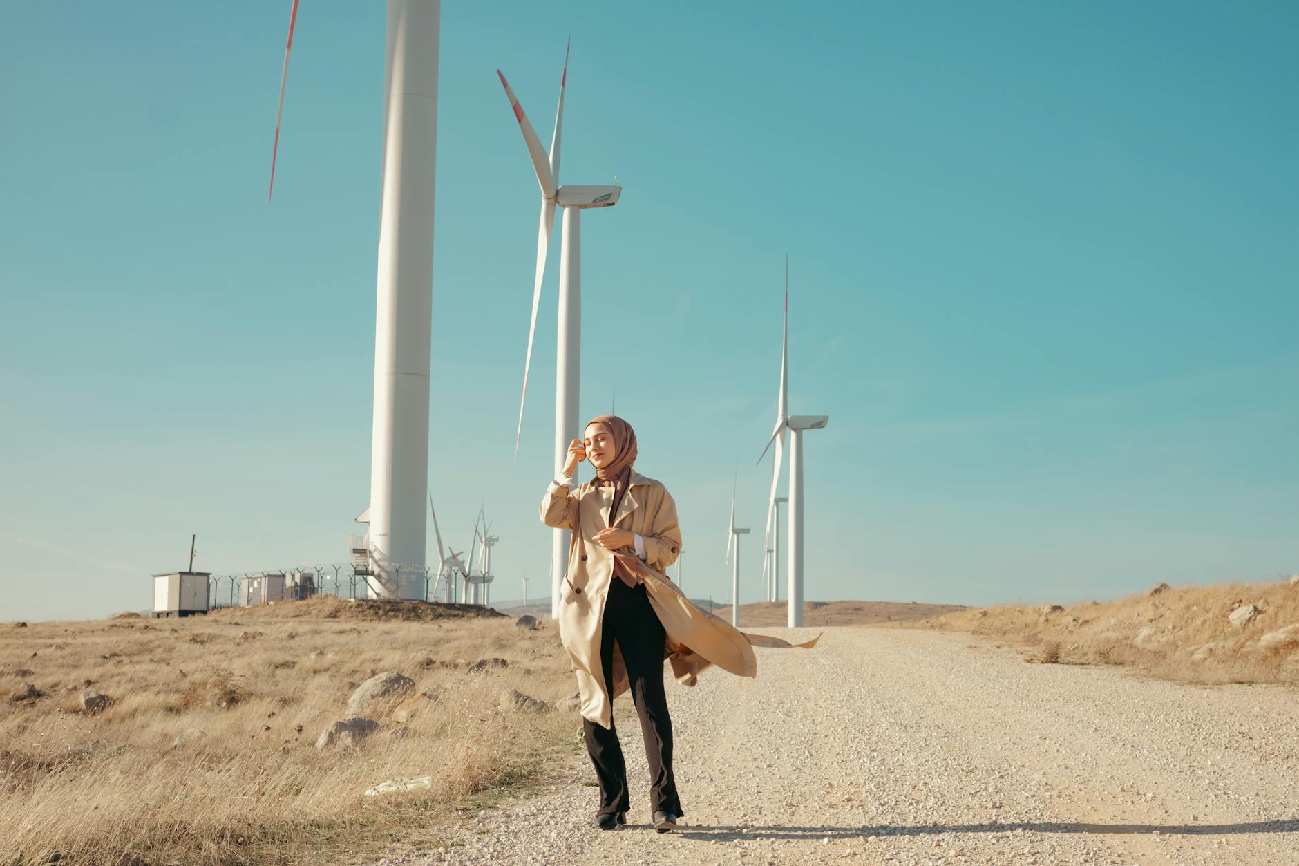 Eco-friendly fashion pieces displayed on hangers with natural lighting