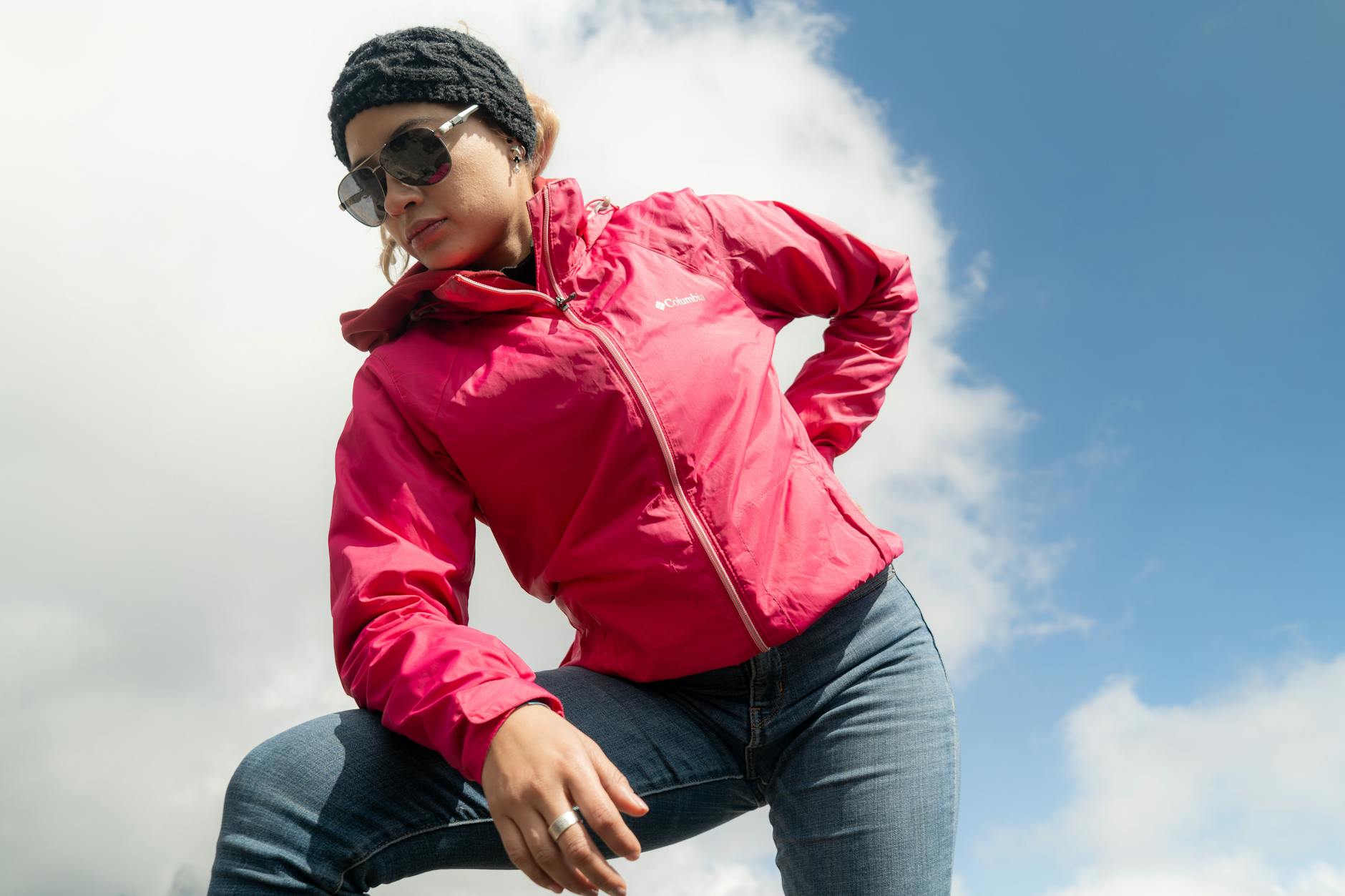 Professional woman wearing versatile jacket suitable for business travel and convertible styling