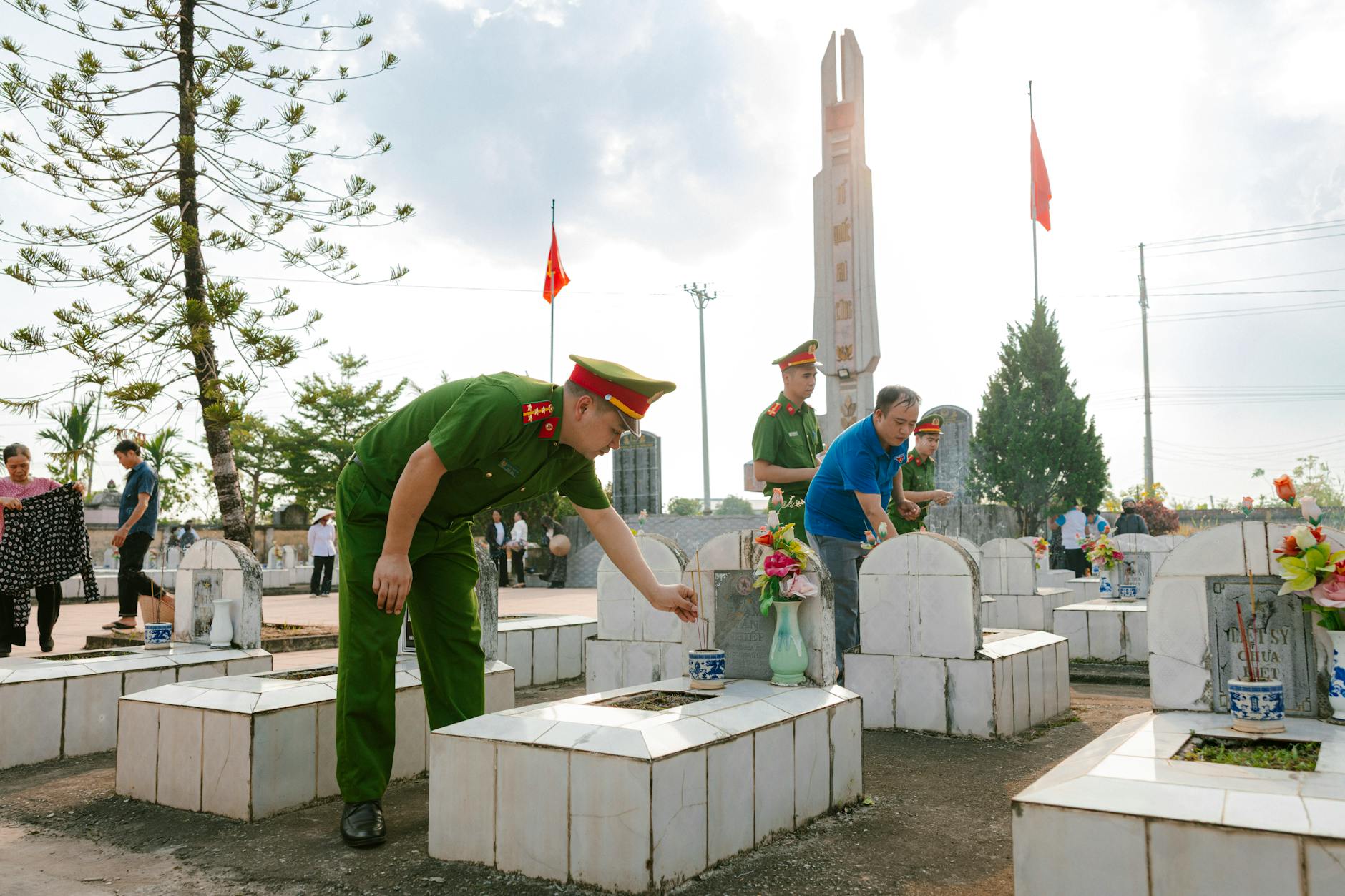Memorial service setting with flowers showcasing the environment where convertible funeral attire would be worn