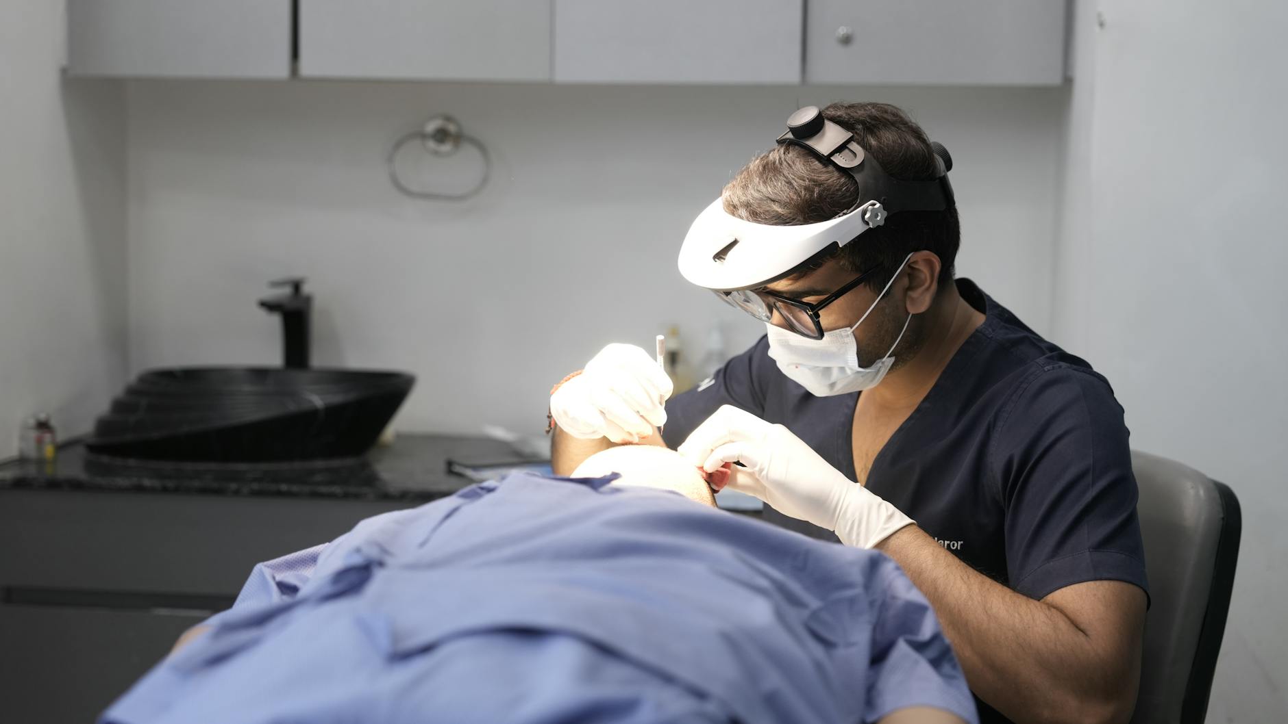 Medical professional consulting with patient about skincare treatment