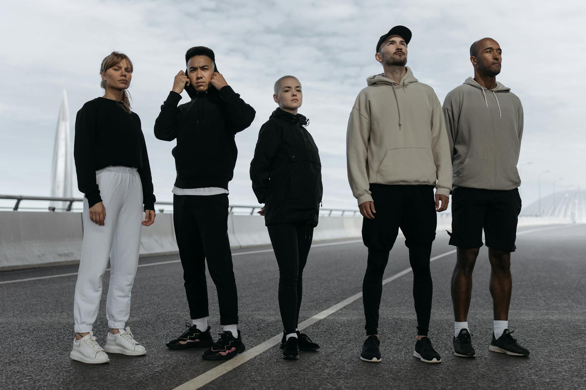 Athletic streetwear outfits including track jackets and chunky sneakers