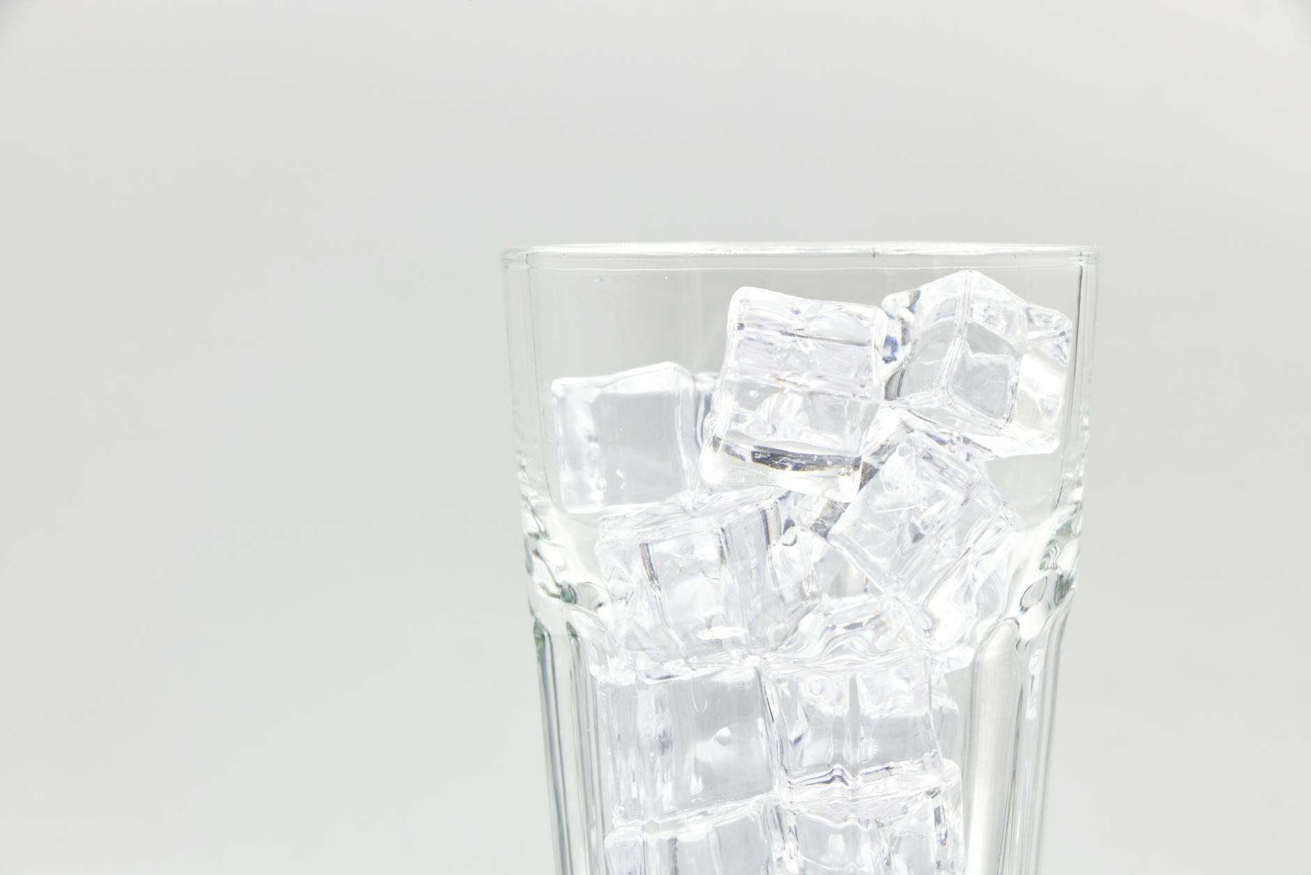 Close-up of clear ice cubes showing crystalline structure and smooth surfaces