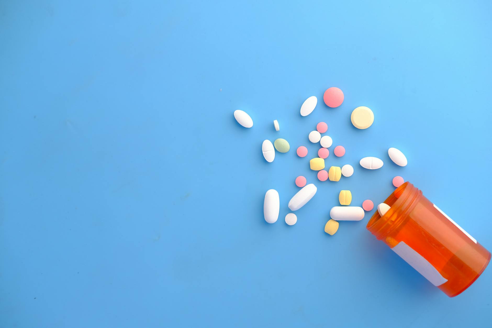 Prescription medication tube and packaging on clean surface