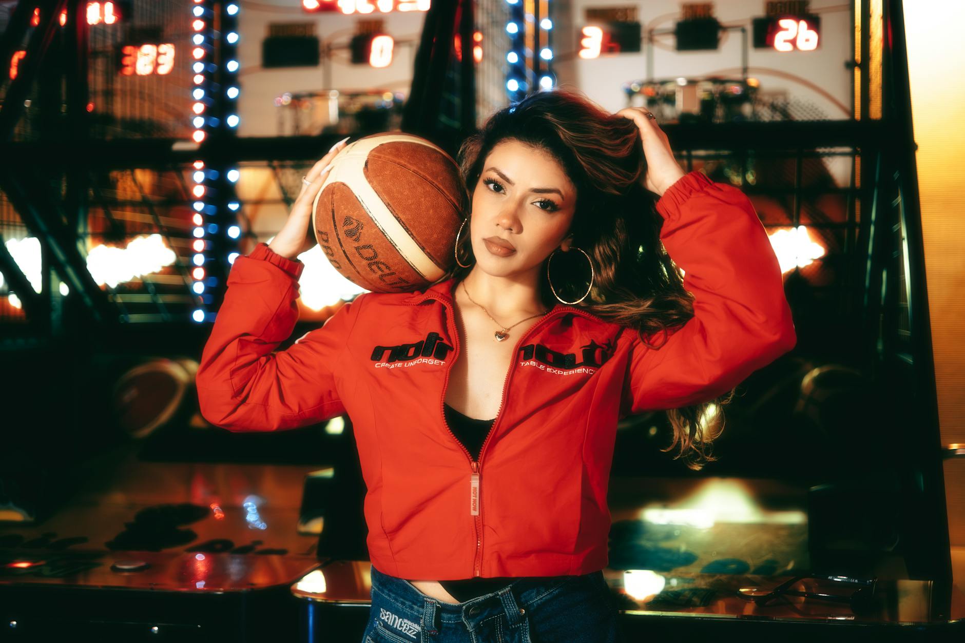 Close-up of a colorful team warm-up jacket styled with minimal accessories