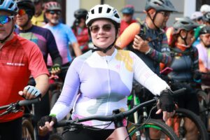 Cycling Kit Aesthetics Are Pedalling Into Luxury Casual Wear Brightly colored cycling jerseys displayed in a row, showing bold color blocking and technical construction