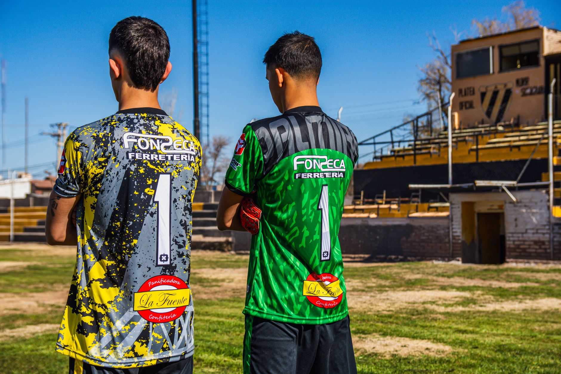 Brightly colored athletic sports jersey laid flat on a surface