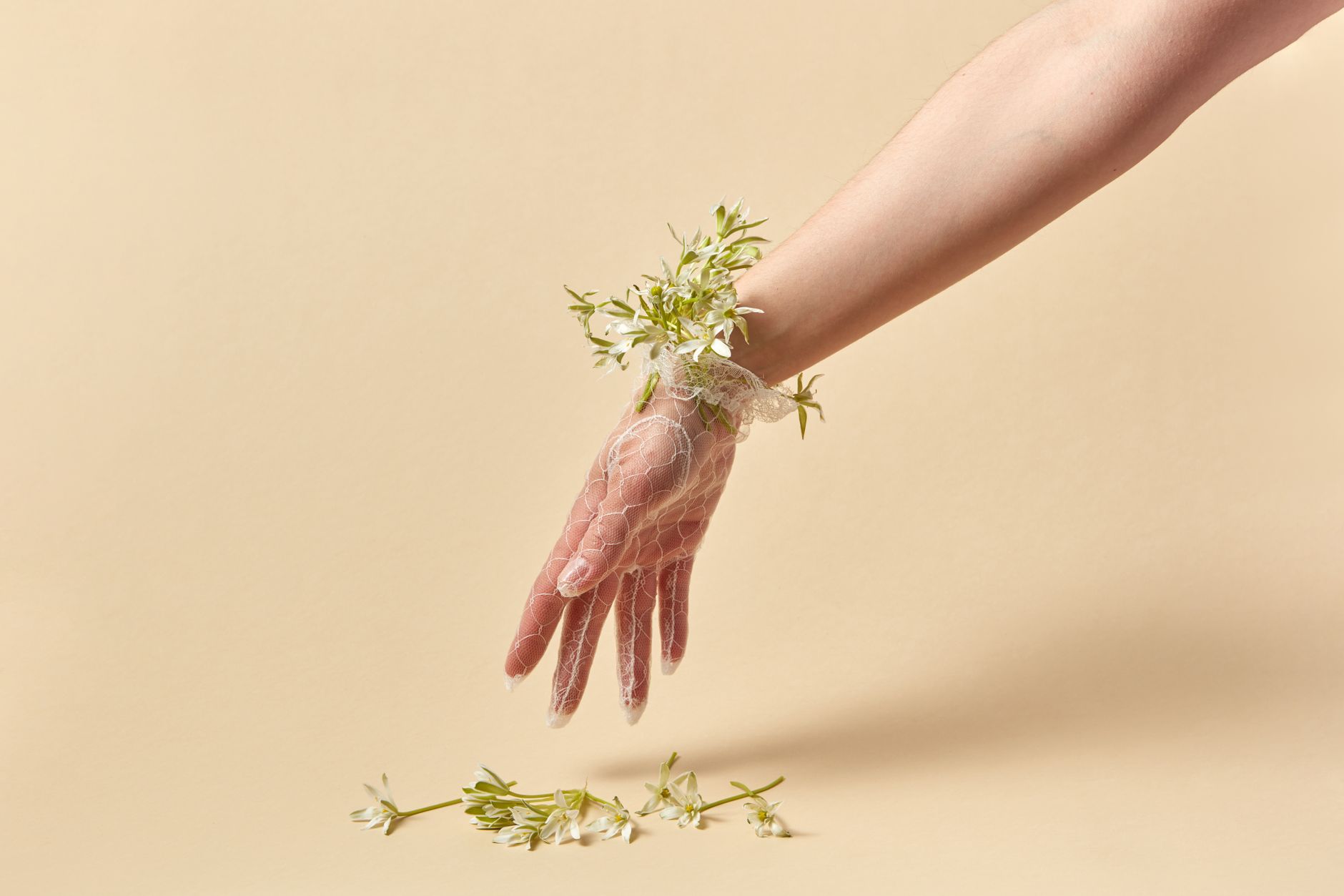 Close-up of a wide fabric band worn on a wrist against clean background