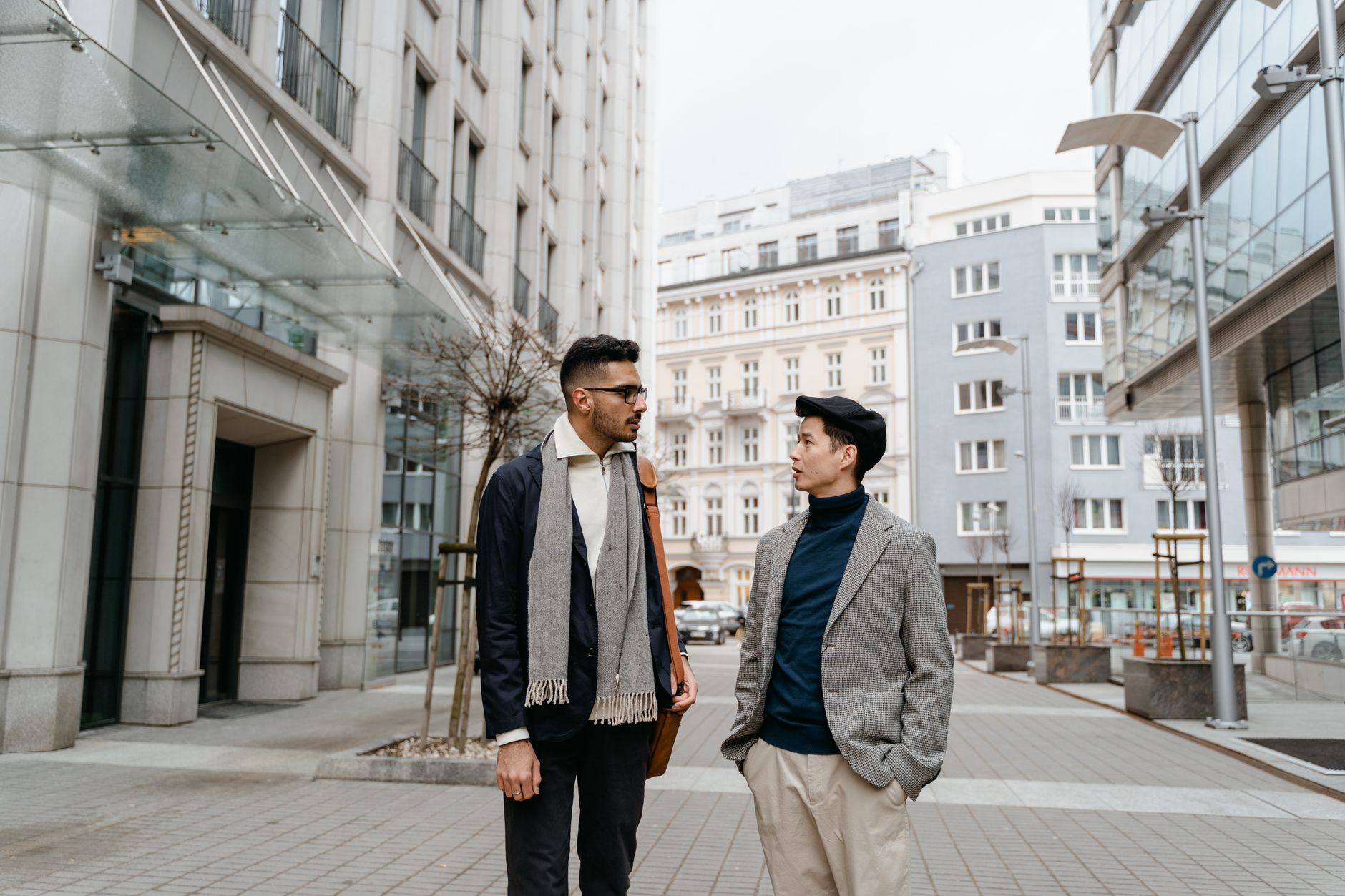 A person wearing a structured heritage blazer styled with tailored trousers and leather loafers