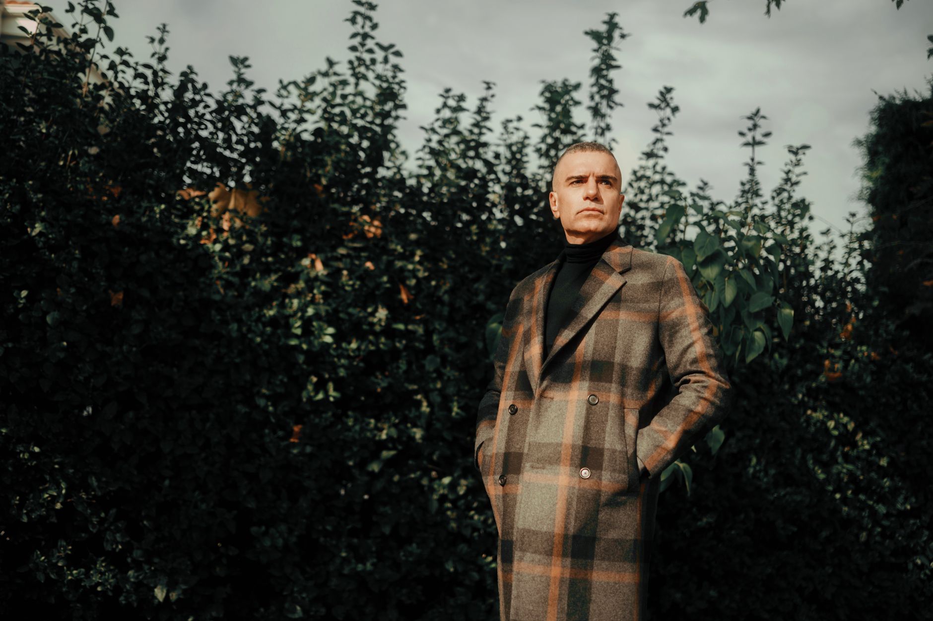 Refined outerwear displayed in a high-end fashion retail context