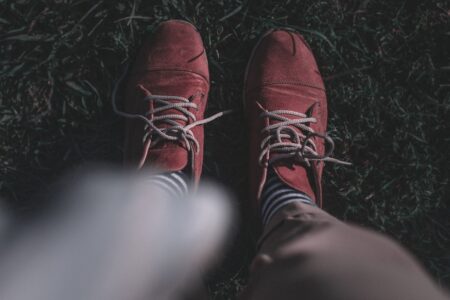 Close-up of knee-length dress socks with a narrow elastic leg band visible below a trouser hem