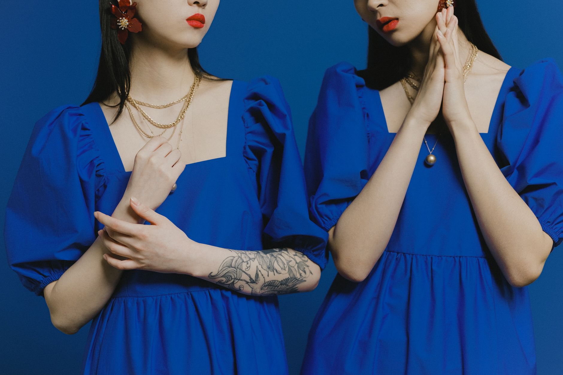 A structured décolleté neckline on a fashion garment showing architectural yoke detailing