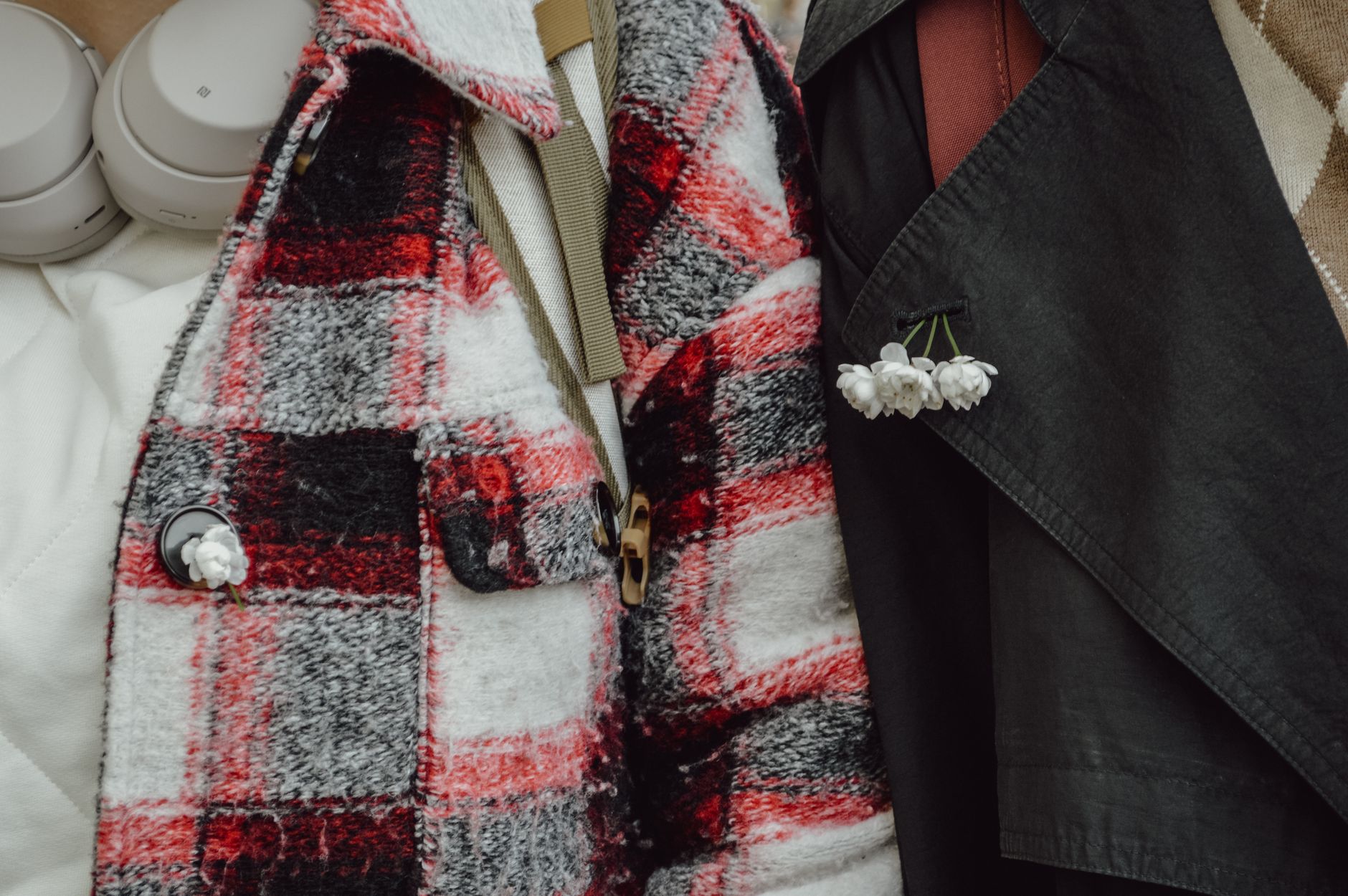 Rear collar detail on a contemporary performance jacket showing articulated panel venting
