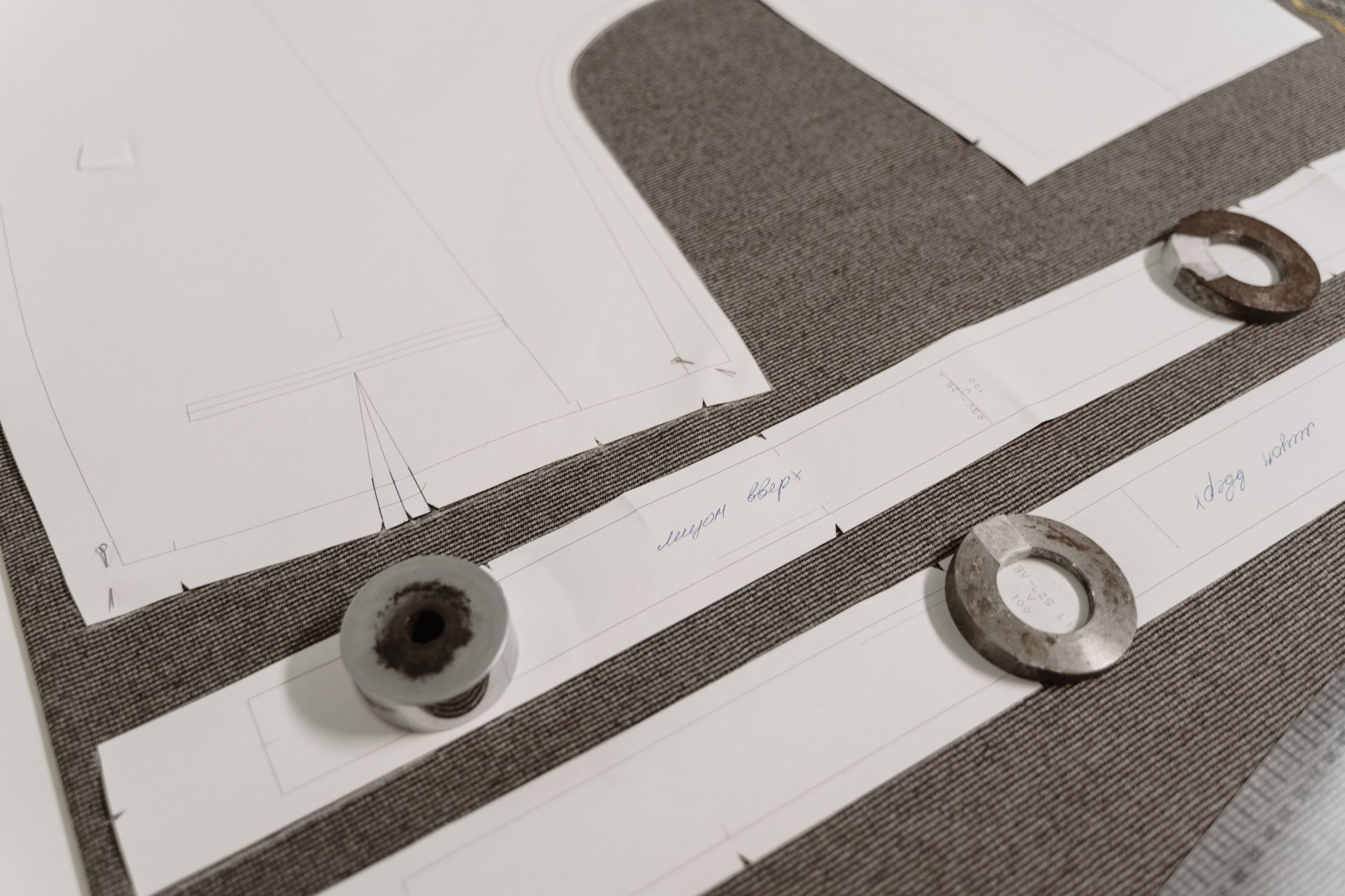 Tailored high-waisted garment showing clean waistband construction with minimal visible hardware