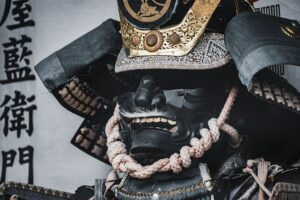 Close-up of traditional kendo do armor with flat woven waist cords tied at the side