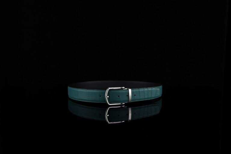 Close-up of a structured minimalist leather belt with clean hardware detail