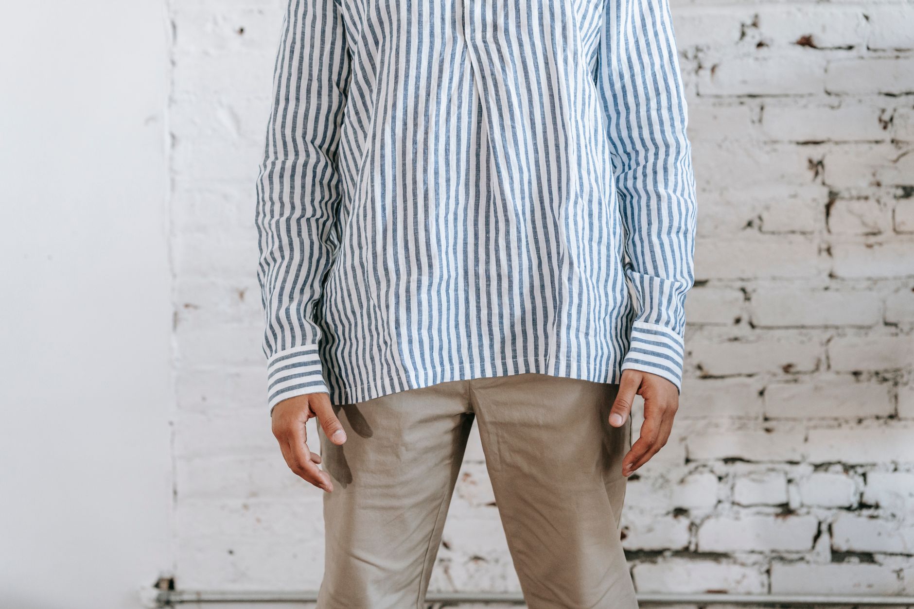 Structured fashion trouser waistband with layered tab and stitching detail