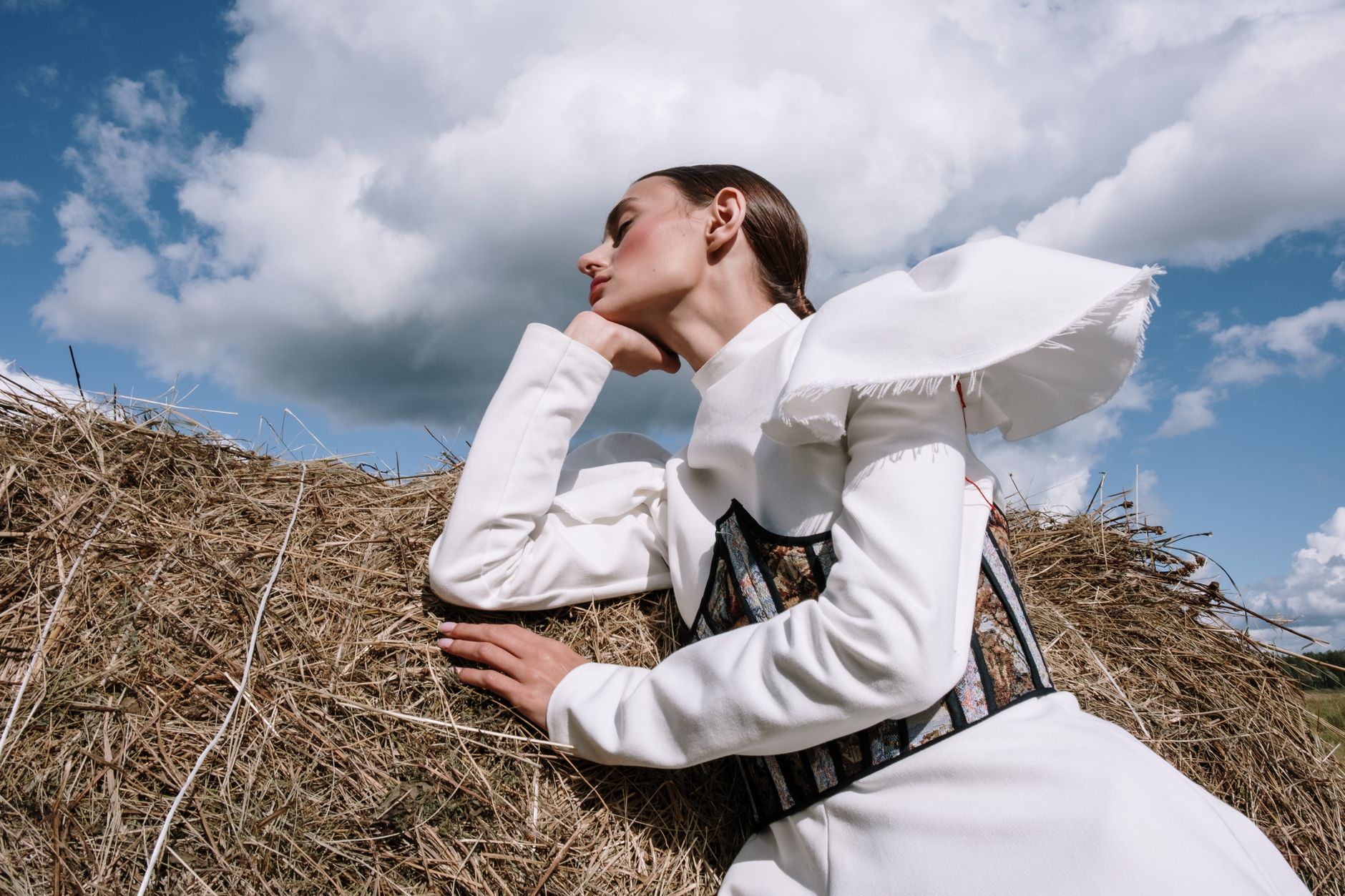 Structured bodice yoke with visible topstitching detail on a tailored garment