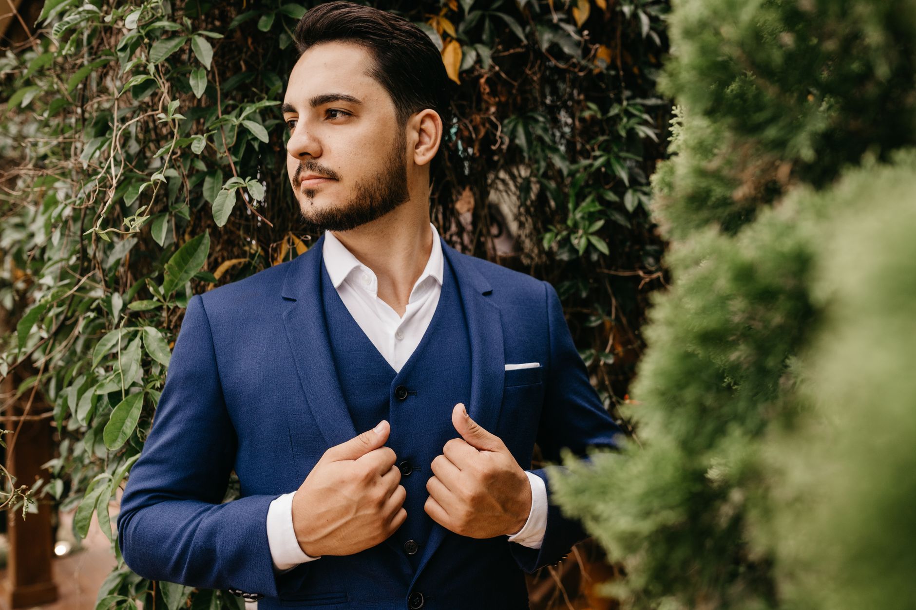 Man wearing a structured dress shirt with a clean placket line and formal collar