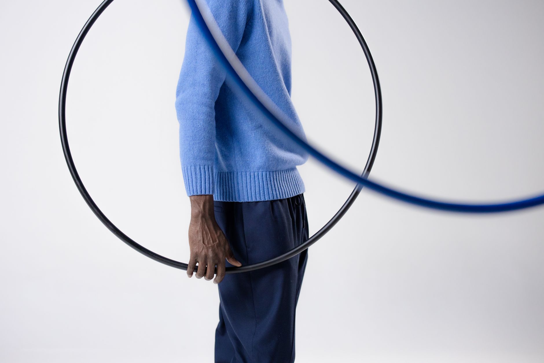Steel croquet hoops set into a green lawn showing thick wire construction and circular profiles