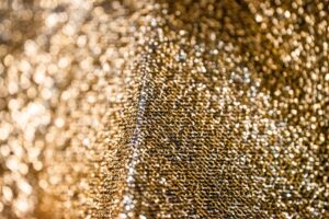 Close-up of dense metallic woven fabric with low sheen surface