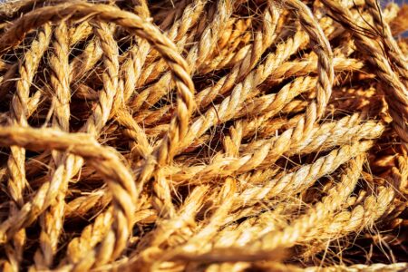 Close-up of tightly wound natural cord showing ribbed texture and geometric structure