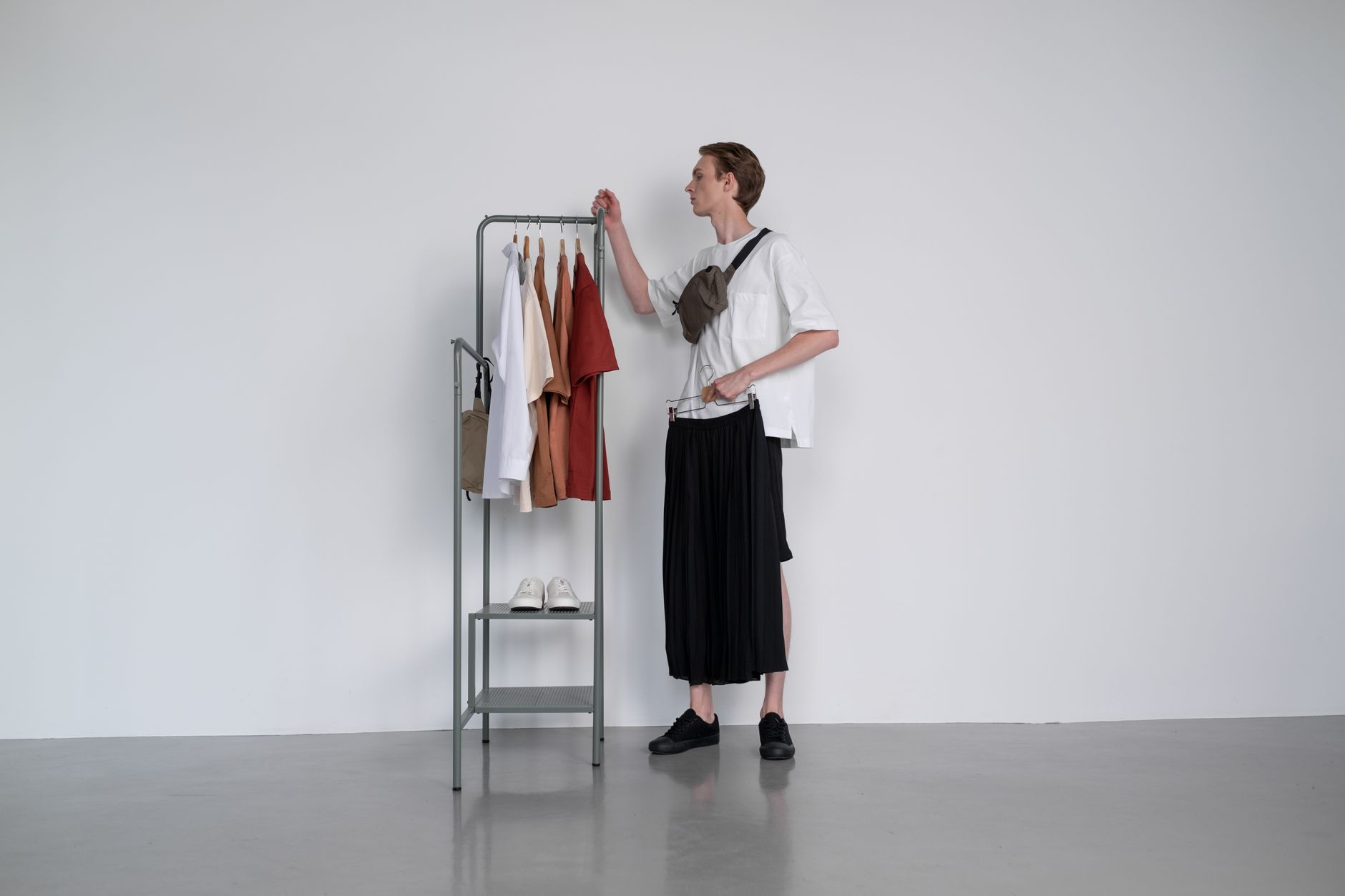 Minimalist mens shirt with structured collar worn with clean tailoring
